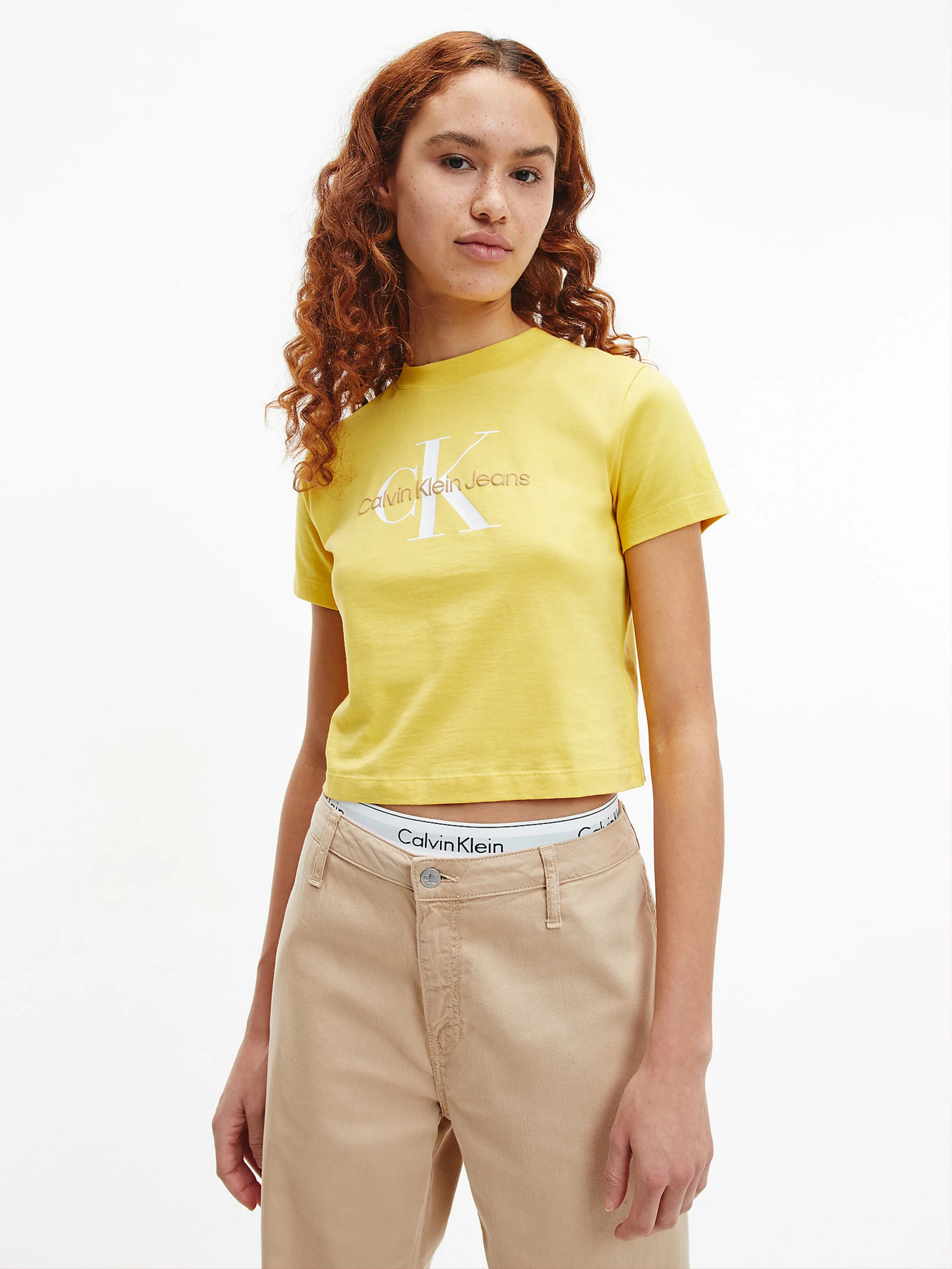 Fotografie Žluté dámské tričko s potiskem Calvin Klein - XS