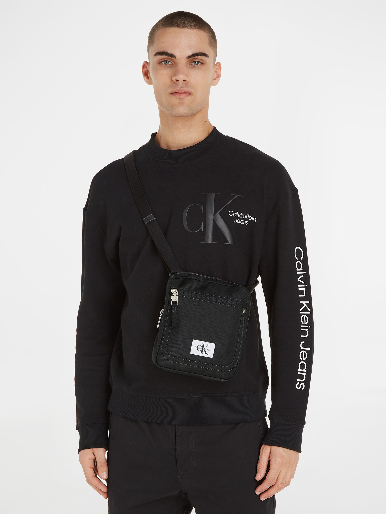Buy Calvin Klein Jeans Monogram Soft Reporter Bag In Black